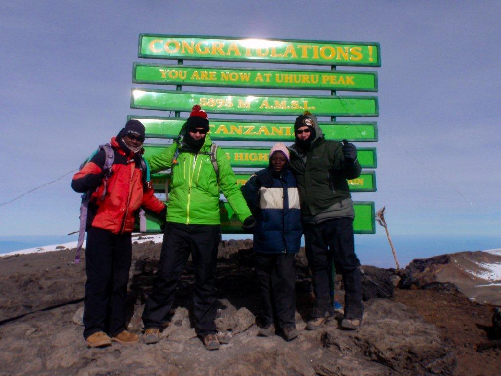 Kili83-  Day5 Uhuru Peak with Mike and Damien.jpg